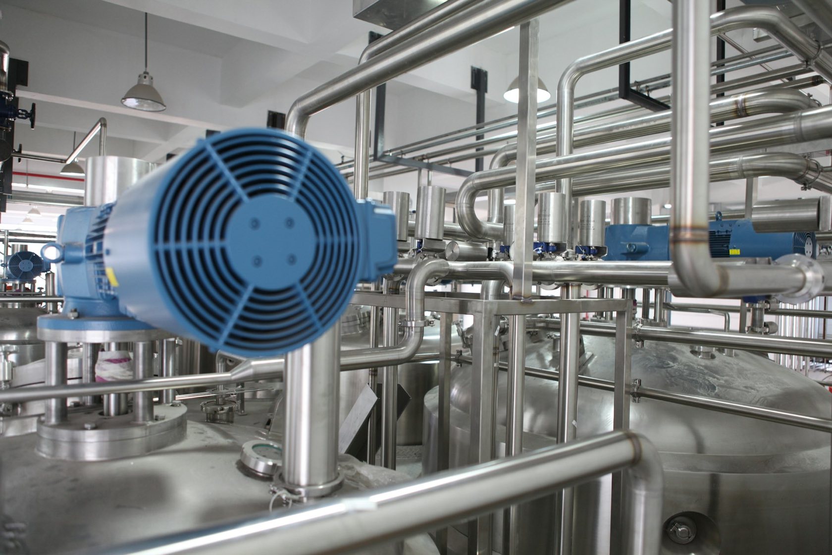 Stainless steel pipework and pump in a food processing plant